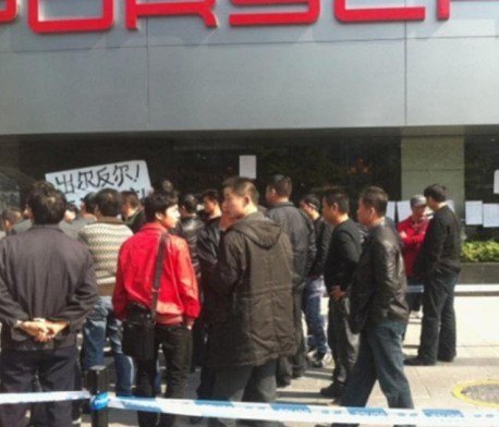 porsche cayenne owner stages massive protest at dealer in china