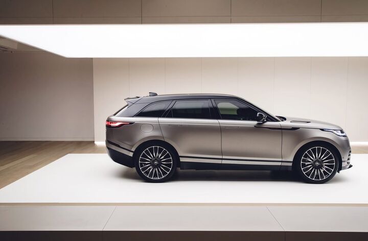 range rover casts a wider sales net with its midsized velar suv