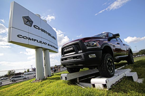 fiat chrysler to bring heavy duty pickup production back to u s shower workers with