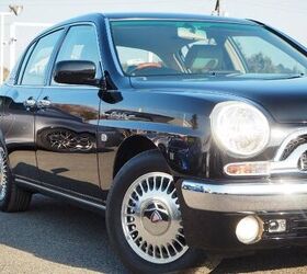 rare rides the toyota origin vintage luxury and suicide doors from 2001