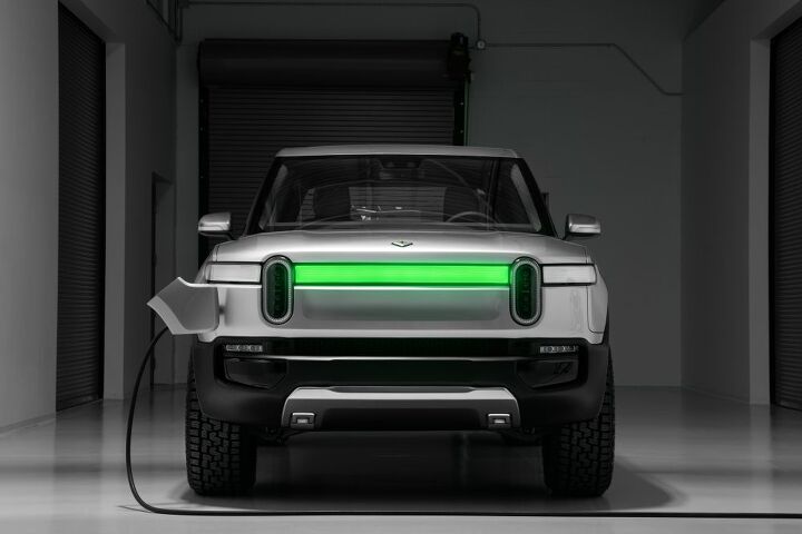rivian reveals all electric pickup with some serious specs