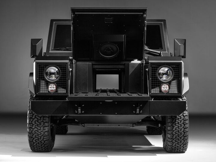 bollinger patents passthrough cargo gate for pickup suv