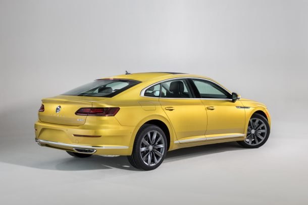 cash piling up on the hood of volkswagens arteon