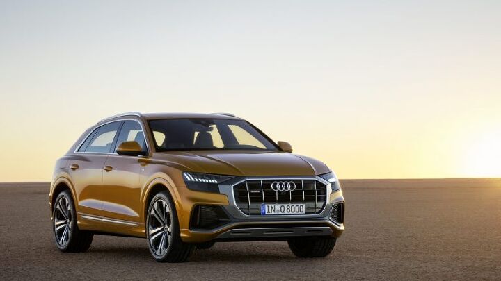 reporting for flagship duty audi unveils q8 four door luxury coupe