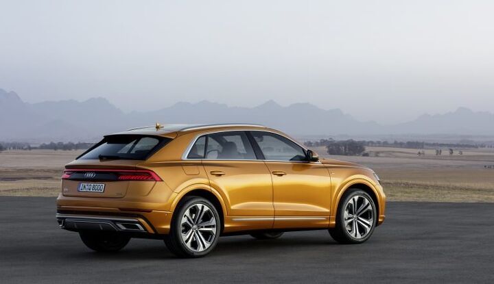 reporting for flagship duty audi unveils q8 four door luxury coupe