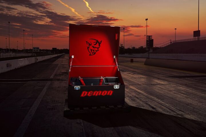 dodge challenger srt demon has a personalized demon crate and a horsepower clue