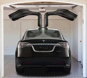 Tesla model x on sale doors in garage