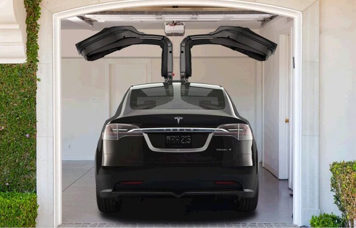 tesla debuts latest vaporware dubbed model x with impractical gullwing doors