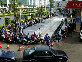chinese motorists react to fuel crisis lets go to the middle east and steal their