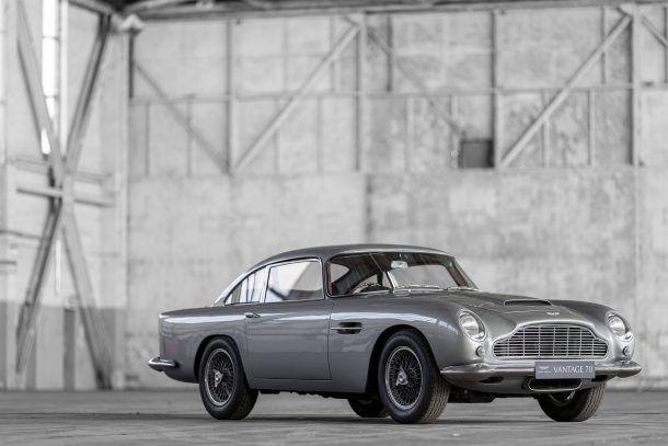 aston martin celebrates 70 years of vantage by parking a bunch inside an empty hangar