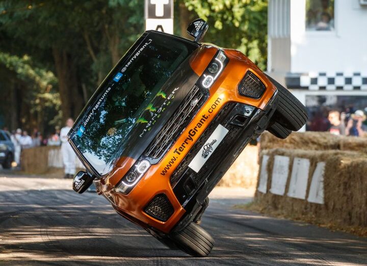land rover terry grant set two wheel record at goodwood festival of speed