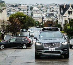 self driving uber car filmed running a red california shuts down pilot program