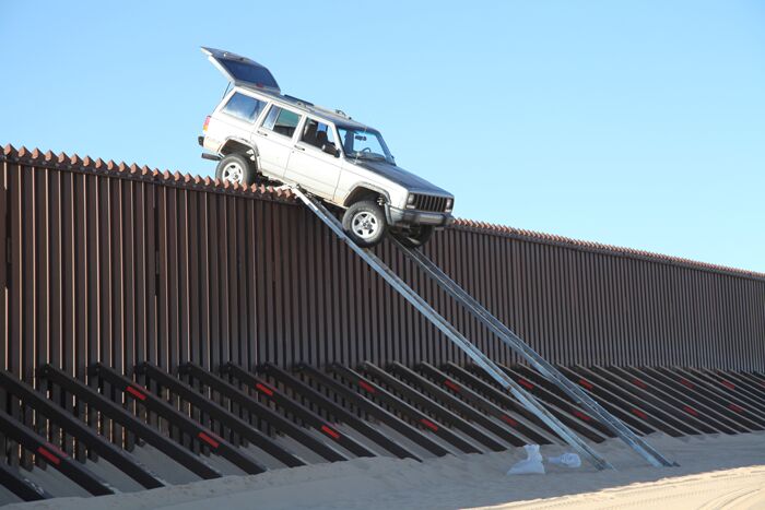 borderline insanity jeep cherokee caught sitting on the fence to mexico