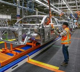gm halts production at nearly all u s plants chip shortage to blame