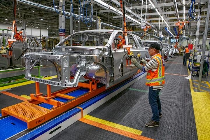 gm halts production at nearly all u s plants chip shortage to blame