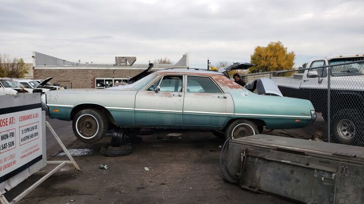 junkyard find 1969 chrysler newport 4 door sedan