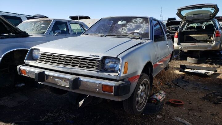 junkyard find 1979 dodge colt with twin stick transmission