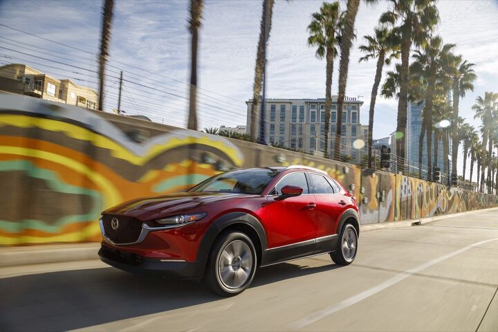 New Mazdas Loiter in Ports As Company Reports Profit Dive