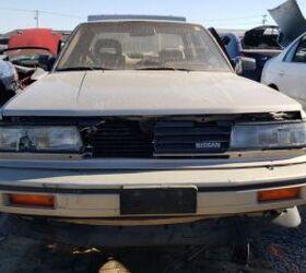 junkyard find 1987 nissan maxima sedan