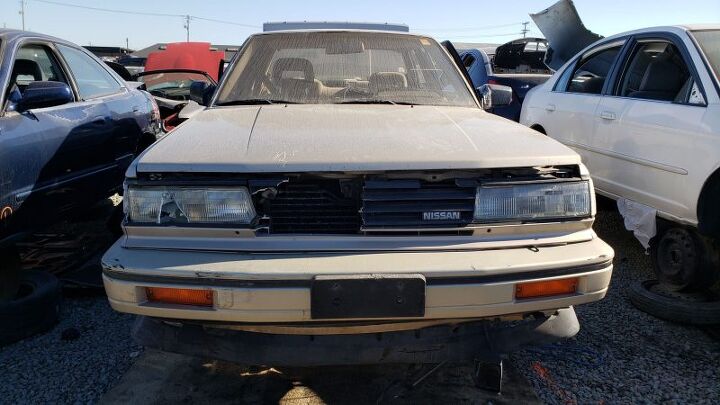 junkyard find 1987 nissan maxima sedan