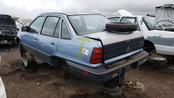 junkyard find 1988 pontiac lemans sedan