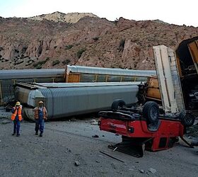 train carrying new jeep gladiator and gmc sierra pickups derails causing carnage