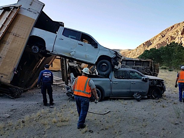train carrying new jeep gladiator and gmc sierra pickups derails causing carnage
