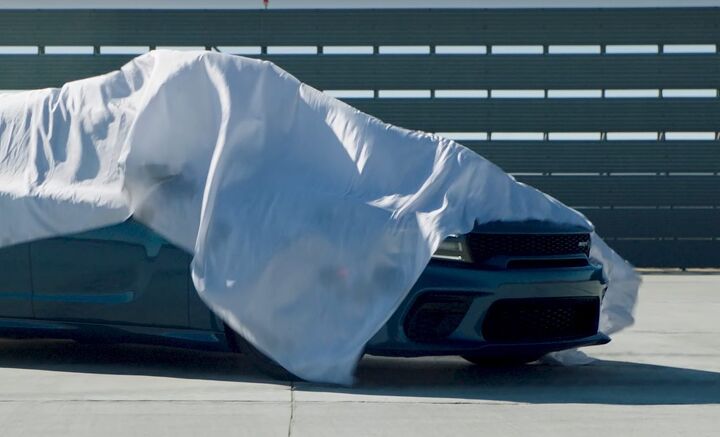 video dodge teases what could be the widebody charger srt