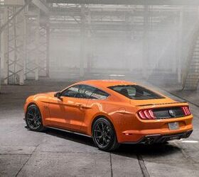 price wars ford pits brawnier four cylinder mustang against chevrolet s bargain v8