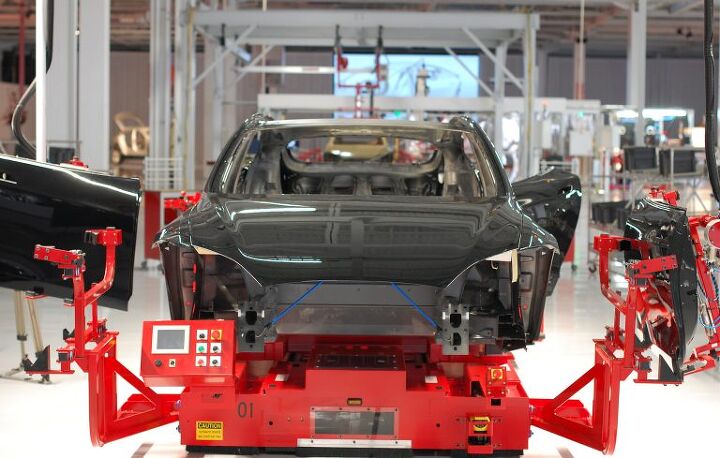 tesla ousts supplier s management and sweetens pay deal to avoid german strike