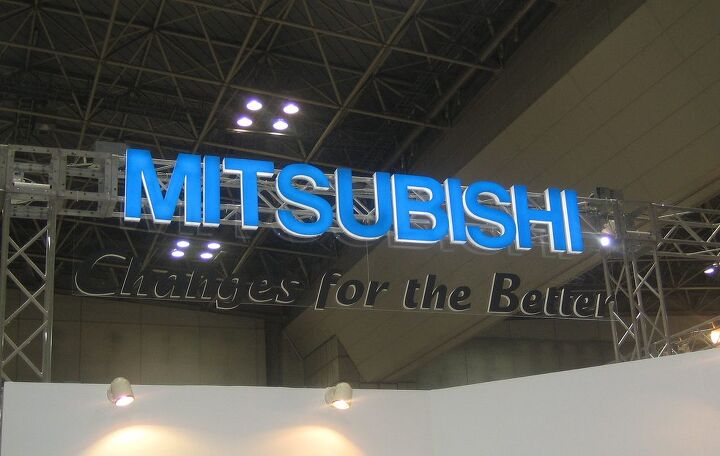 nissan puts more executives on bus to mitsubishi