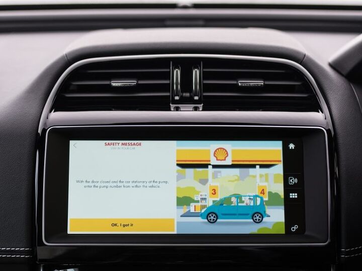 jaguar and shell partner for world s first in car fuel purchase system