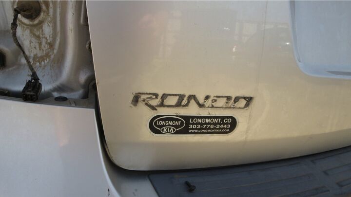 junkyard find 2009 kia rondo now with more biohazard