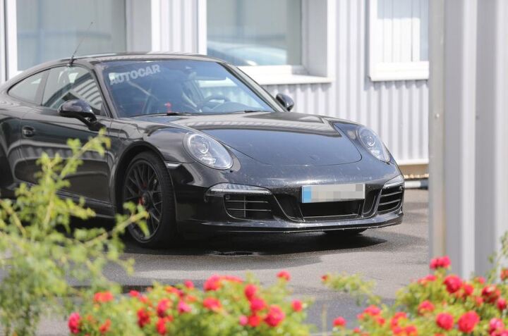 while you were sleeping phaeton axed in uk porsche 911 gt with a stick and gm is