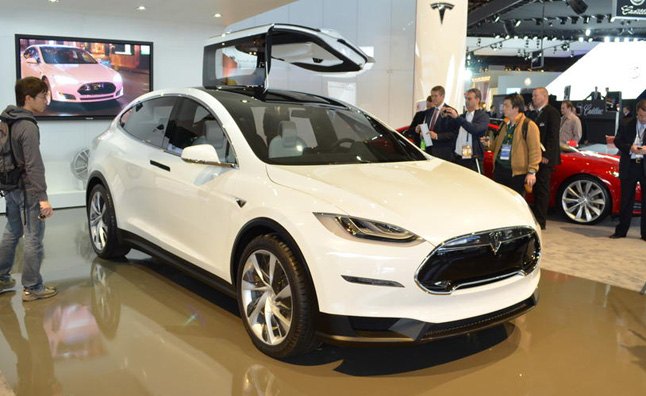 tesla diffusing demand for model x prior to showroom debut