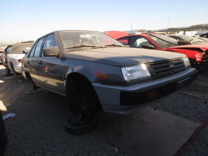 junkyard find 1988 plymouth colt premier sedan