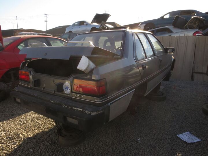 junkyard find 1988 plymouth colt premier sedan