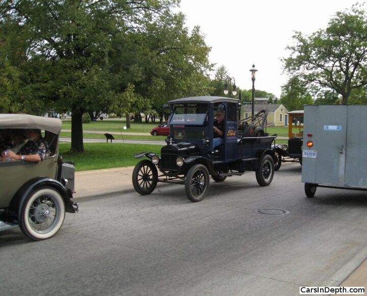 63rd annual old car festival at greenfield village vintage motorcars being driven as