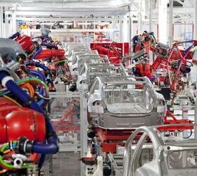 tesla surprises analysts with second quarterly profit depending how you do the math