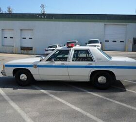 Cop Drives Classic Cop Car 1991 Ford LTD Crown Victoria and 1996