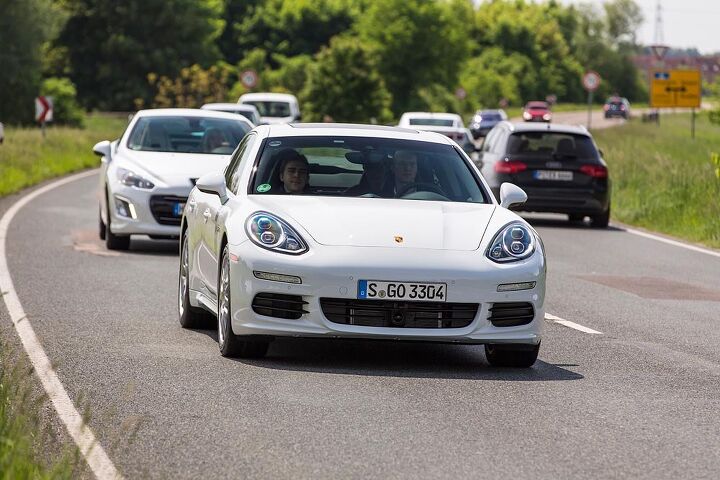 porsche invites 42 journalists to prove that the plug in panamera uses more gas than