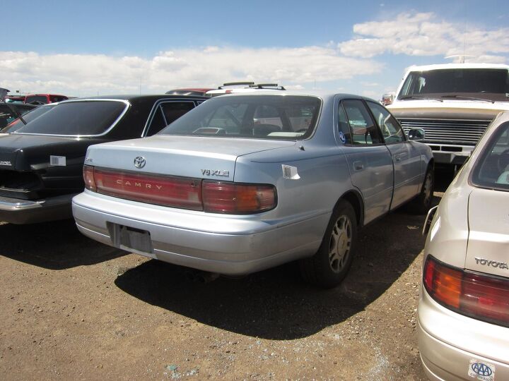 auction to crusher 12 weeks in the lives of two cars at a self service wrecking yard