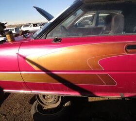 junkyard find 1980 mazda rx 7 with incredibly 80s custom paint