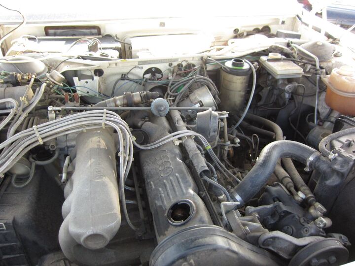 junkyard find 1984 audi 5000 s with voodoo incantantion to ward off unintended