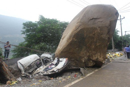 rock on enormous chinese boulder kills cars 400 cases of beer