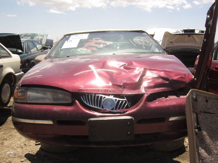 junkyard find 1997 mercury cougar xr7 with florida style faux vertible option