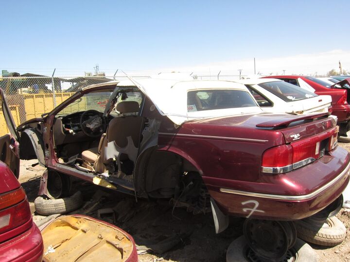 junkyard find 1997 mercury cougar xr7 with florida style faux vertible option