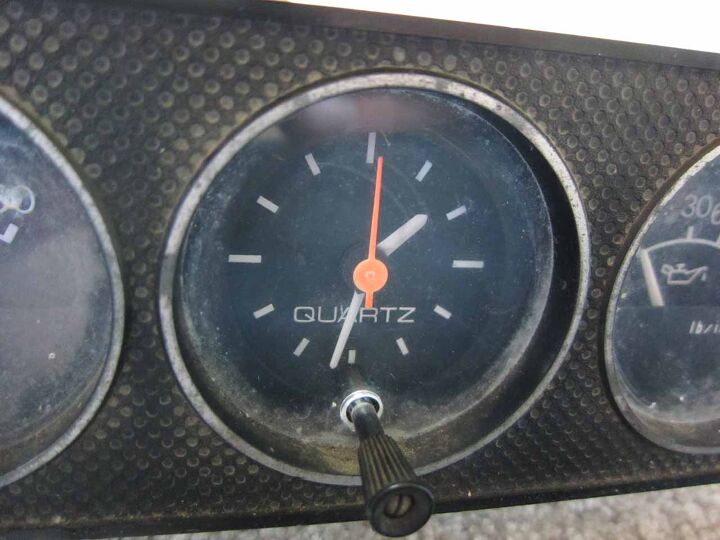 name that car clock black quartz analog