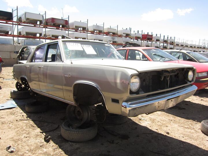 junkyard find 1968 plymouth valiant signet sedan