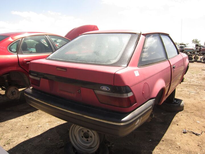 junkyard find 1990 ford escort pony